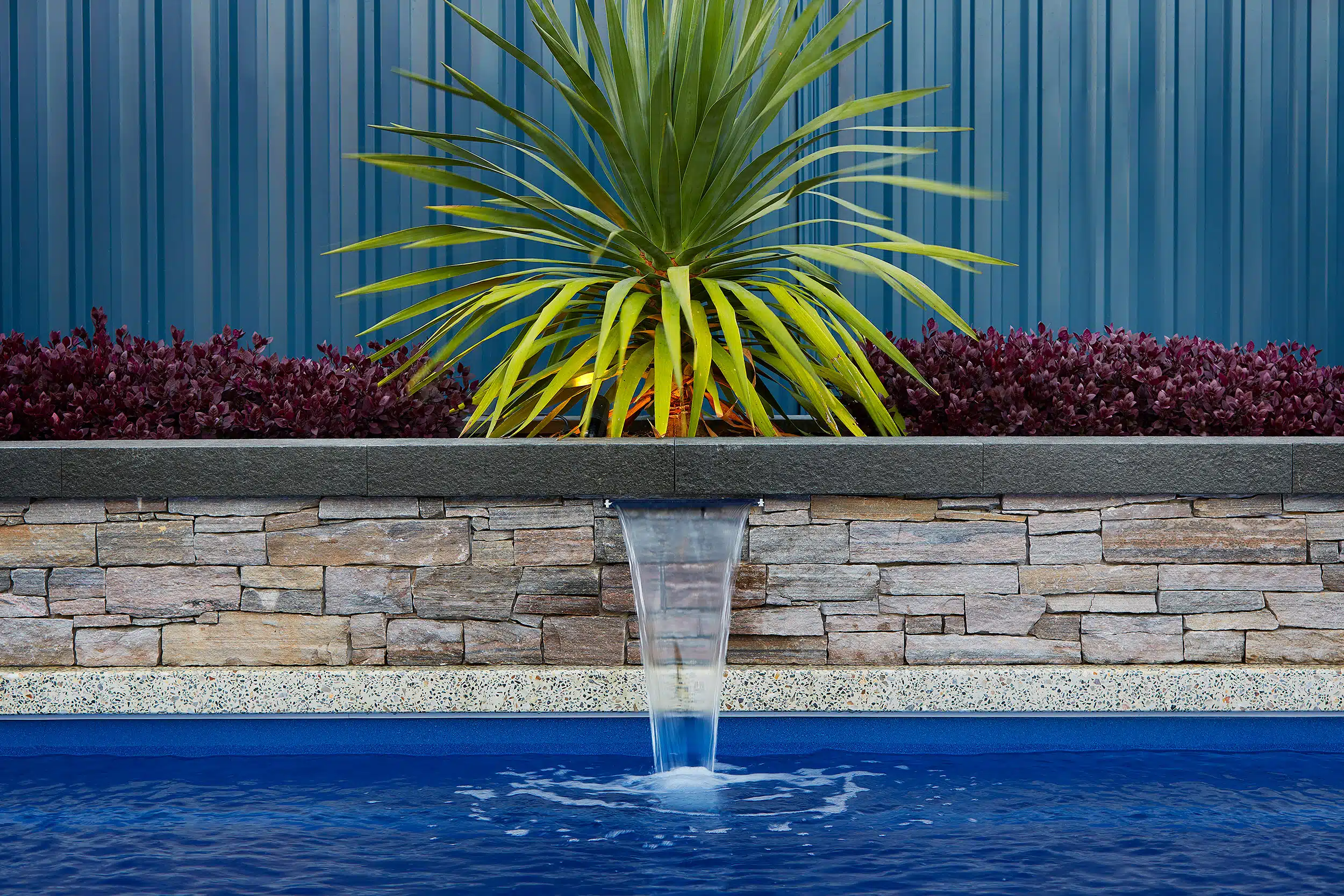 swimming pool with water feature