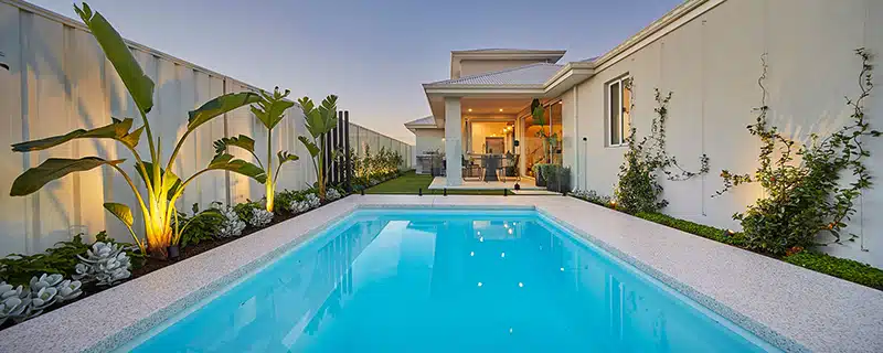 concrete swimming pool at dusk